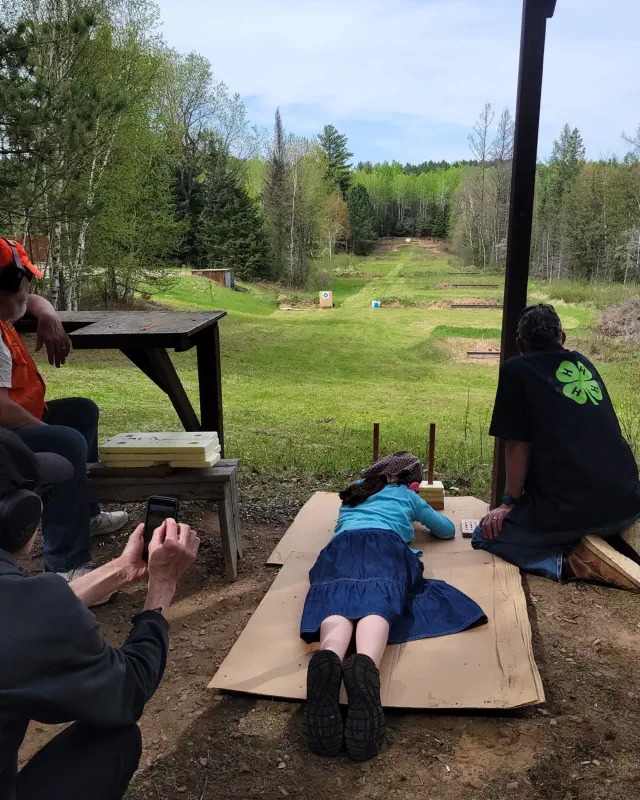 Girl shooting from ground at long range Girl shooting from ground at long range