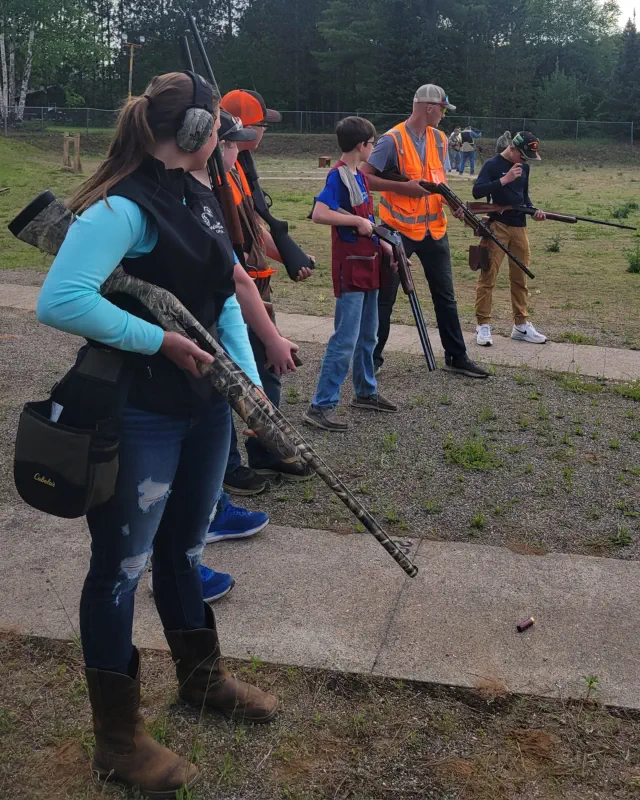 Kids gun safety Kids learning gun safety at rifle range
